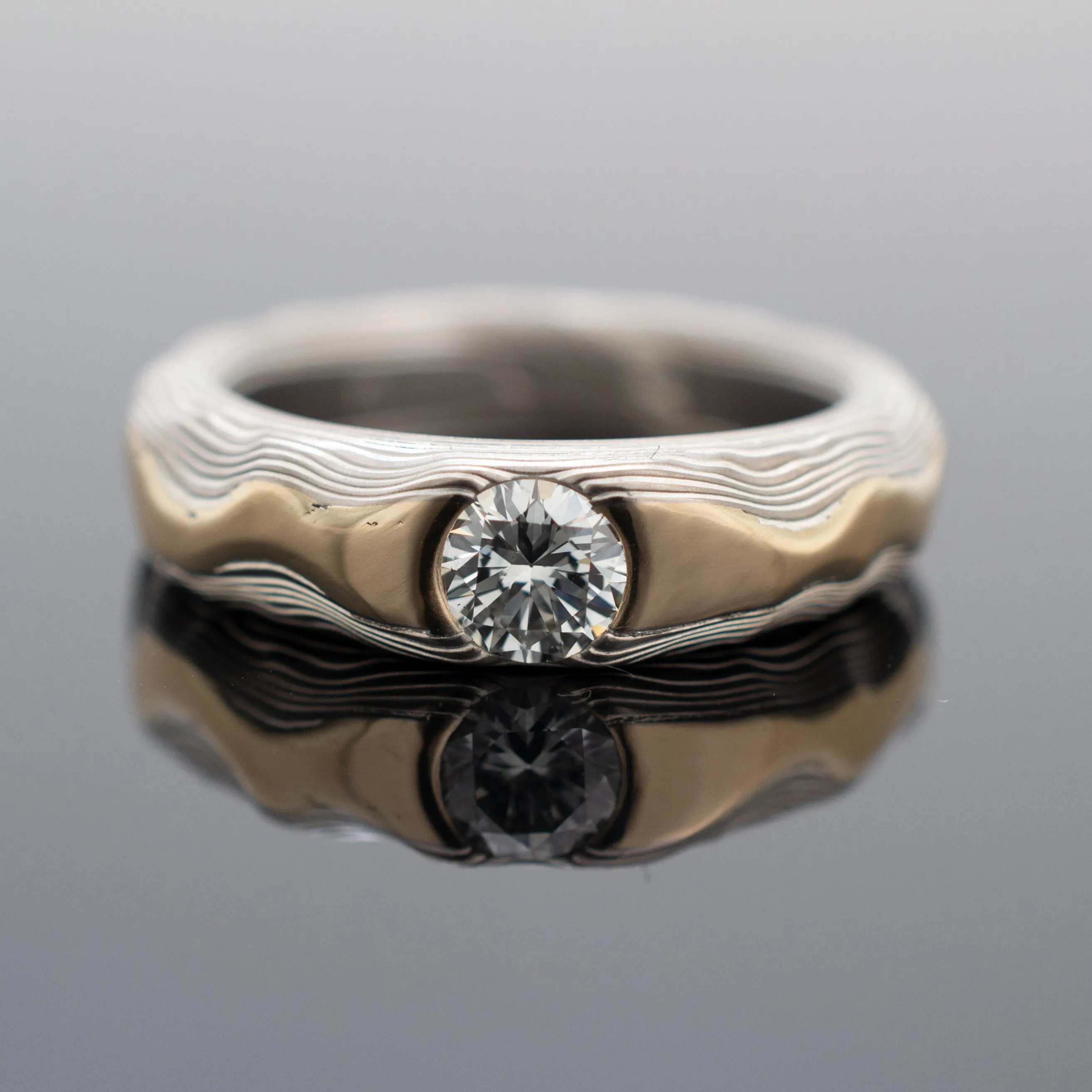 Mokume Guri Bori Ring in Ash with Yellow Gold Ridgeline and Diamond